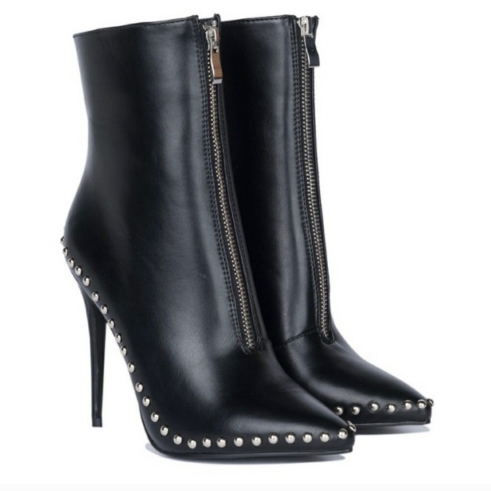 Black studded heeled boot in size 7